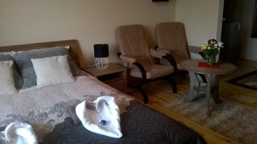 Posedenie v ubytovaní Apartamenty Przy Farze
