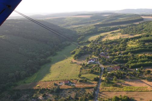 a view of a valley from a gondola at Pálos Resort in Zalacsány