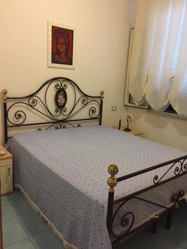 Postel nebo postele na pokoji v ubytování Villetta Le Maldive Del Salento