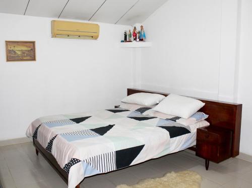 Postel nebo postele na pokoji v ubytování Fortune Rest Villa