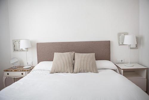 Posteľ alebo postele v izbe v ubytovaní Apartamento Mendoza