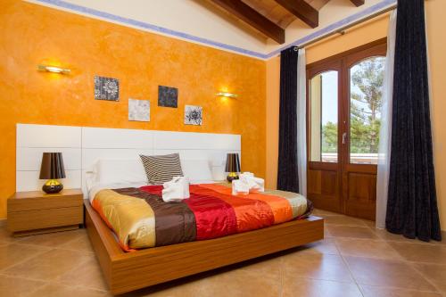 מיטה או מיטות בחדר ב-Villa Son Ferragut