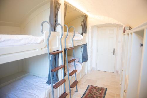 a hallway with bunk beds in a room at 51 Degrees North in Crosshaven
