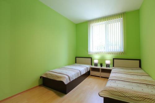 Ένα ή περισσότερα κρεβάτια σε δωμάτιο στο Kabakum Sea View Beach Apartment