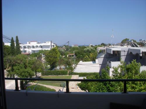 a view of a city from a balcony at Seascape Apartment with Private Balcony in Faliraki in Faliraki