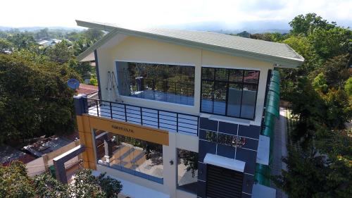 an aerial view of a house with a balcony at Ralphseej Pension House in Moalboal
