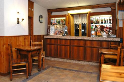 Zona de lounge sau bar la Albergo Passet