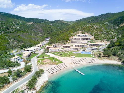 an aerial view of a resort next to the ocean at Thassos Grand Resort in Alyki