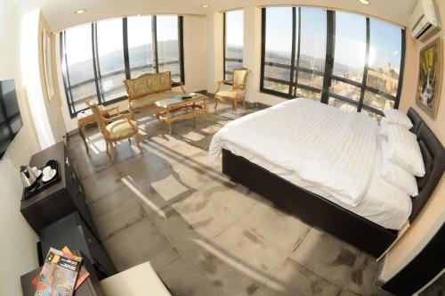 Postel nebo postele na pokoji v ubytování Sindyan Resort
