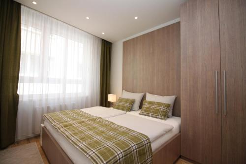 Katil atau katil-katil dalam bilik di Sarajevo Daily Apartments