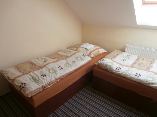 Postel nebo postele na pokoji v ubytování Vila Jaro