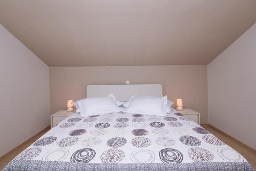 Katil atau katil-katil dalam bilik di Sea View Apartment Gin Brela