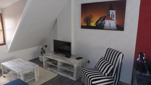 TV in/ali zabaviščno središče v nastanitvi Penzion U Žabáka