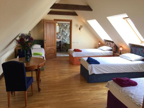 Ένα ή περισσότερα κρεβάτια σε δωμάτιο στο Peahen Residence