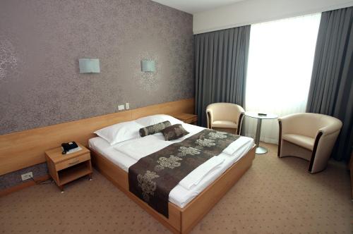 Hotel Zovko Zagrebにあるベッド