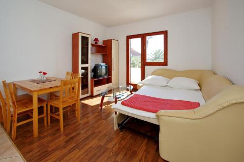 Apartments Valaにあるベッド