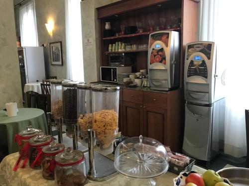 A kitchen or kitchenette at Hotel Giglio