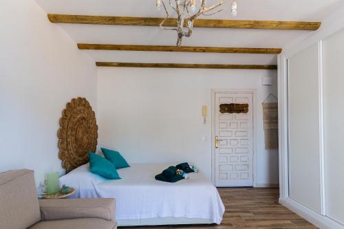 Giường trong phòng chung tại Ático Junto al Mar