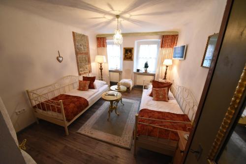 Katil atau katil-katil dalam bilik di GoldGemäuer Appartements