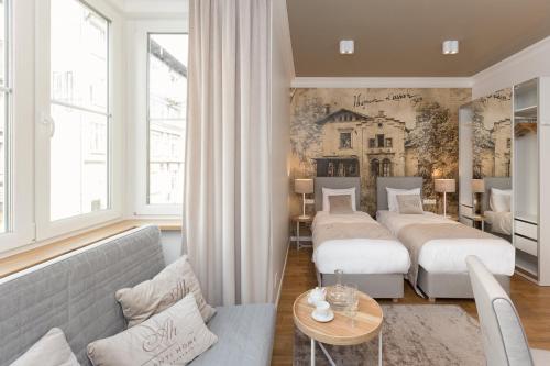 Posteľ alebo postele v izbe v ubytovaní AVANTI Home