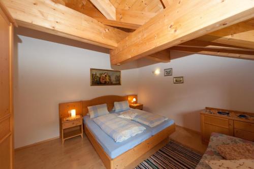 Кровать или кровати в номере Haus Taumberger