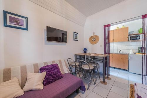 Η κουζίνα ή μικρή κουζίνα στο Apartments Eva