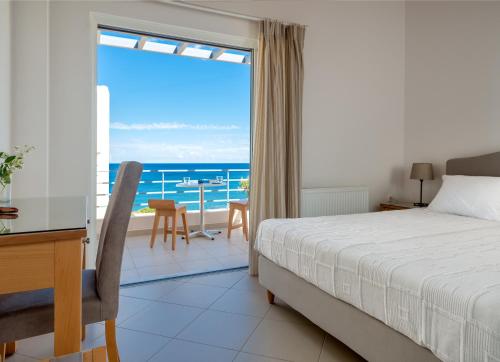 Postel nebo postele na pokoji v ubytování Pelagia Aphrodite Hotel