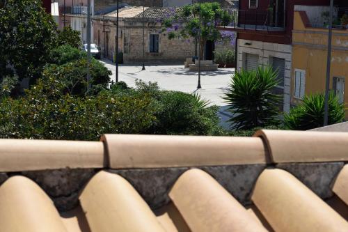 a view of a city from a balcony at La casa di Bice in Cassibile