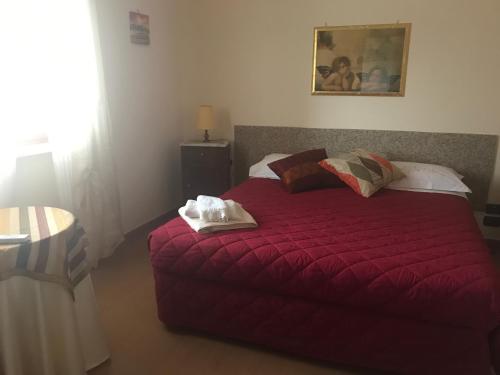 Кровать или кровати в номере La Quercia