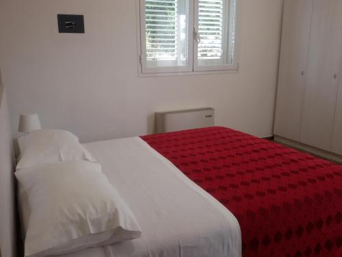 Letto o letti in una camera di Blu Salentino b&b con Parcheggio Privato Gratuito