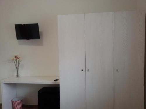 TV o dispositivi per l'intrattenimento presso Blu Salentino b&b con Parcheggio Privato Gratuito
