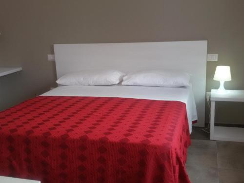 Letto o letti in una camera di Blu Salentino b&b con Parcheggio Privato Gratuito