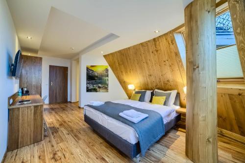 Posteľ alebo postele v izbe v ubytovaní Hotel Górski