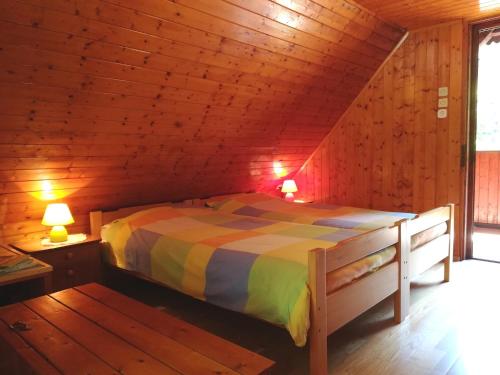 Ένα ή περισσότερα κρεβάτια σε δωμάτιο στο Chalet Iskaretreat