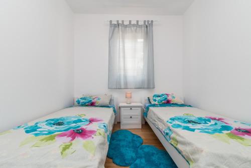 Posteľ alebo postele v izbe v ubytovaní "Blue"