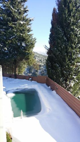 Swimmingpoolen hos eller tæt på Pacithea Villas