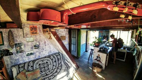 an interior view of a rv with a person in a room at Viejo Lobo in Cabo Polonio