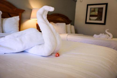 Ένα ή περισσότερα κρεβάτια σε δωμάτιο στο Suite Dreams Hotel