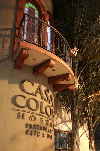 a building with a balcony on the side of it at Hotel Casa Colon in San José