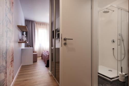Koupelna v ubytování Rooms Albachiara