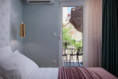 Postel nebo postele na pokoji v ubytování Rooms Albachiara