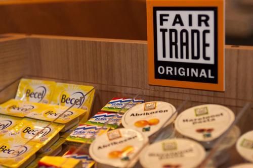 a display of fast food snacks on a shelf at Hotel La Bohème in Amsterdam