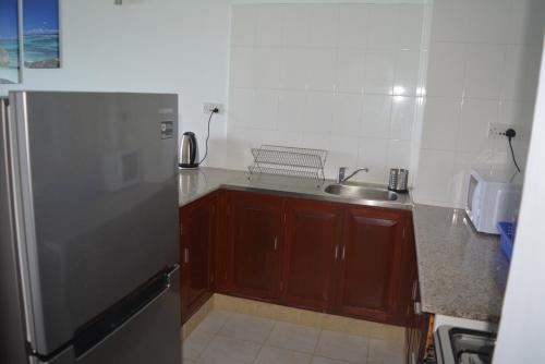 Kuchyň nebo kuchyňský kout v ubytování ManFiyo Guest House