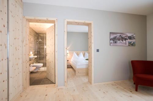 Koupelna v ubytování Romantik Hotel Muottas Muragl