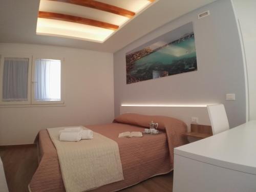 Cama o camas de una habitación en Caelum Case Vacanza