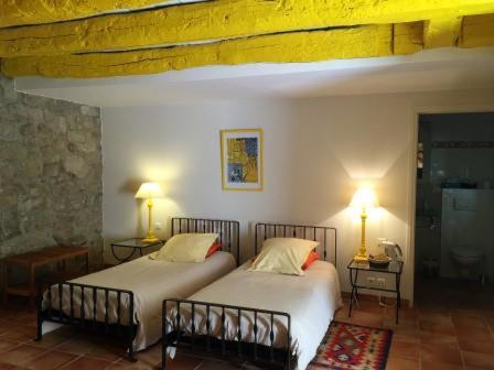 Säng eller sängar i ett rum på Le clos Saint Aubin
