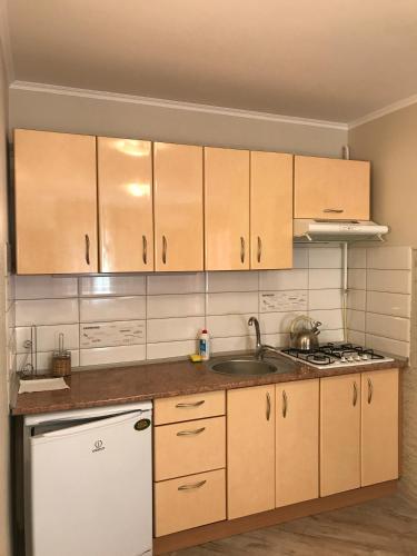 Una cocina o zona de cocina en Yuzhniy Dvorik