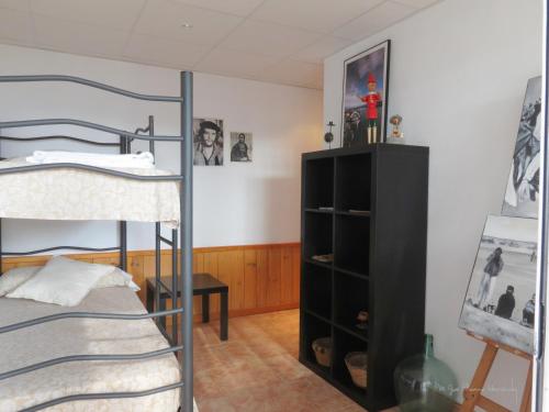 A bed or beds in a room at La Casa de la Lluna