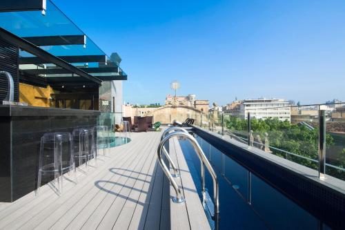 
a view from the balcony of a large building at Hotel Bagués in Barcelona
