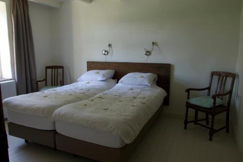 Katil atau katil-katil dalam bilik di B&B van Beijden